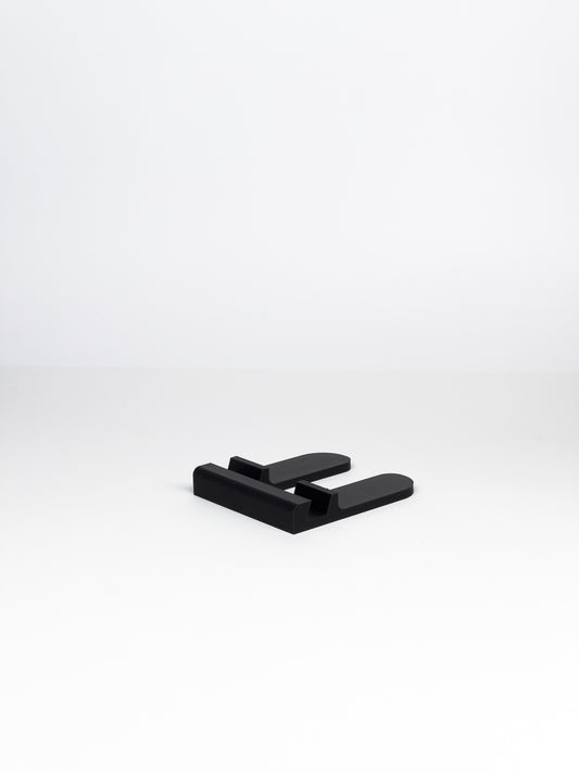 Minimalistyczna podstawka pod telefon