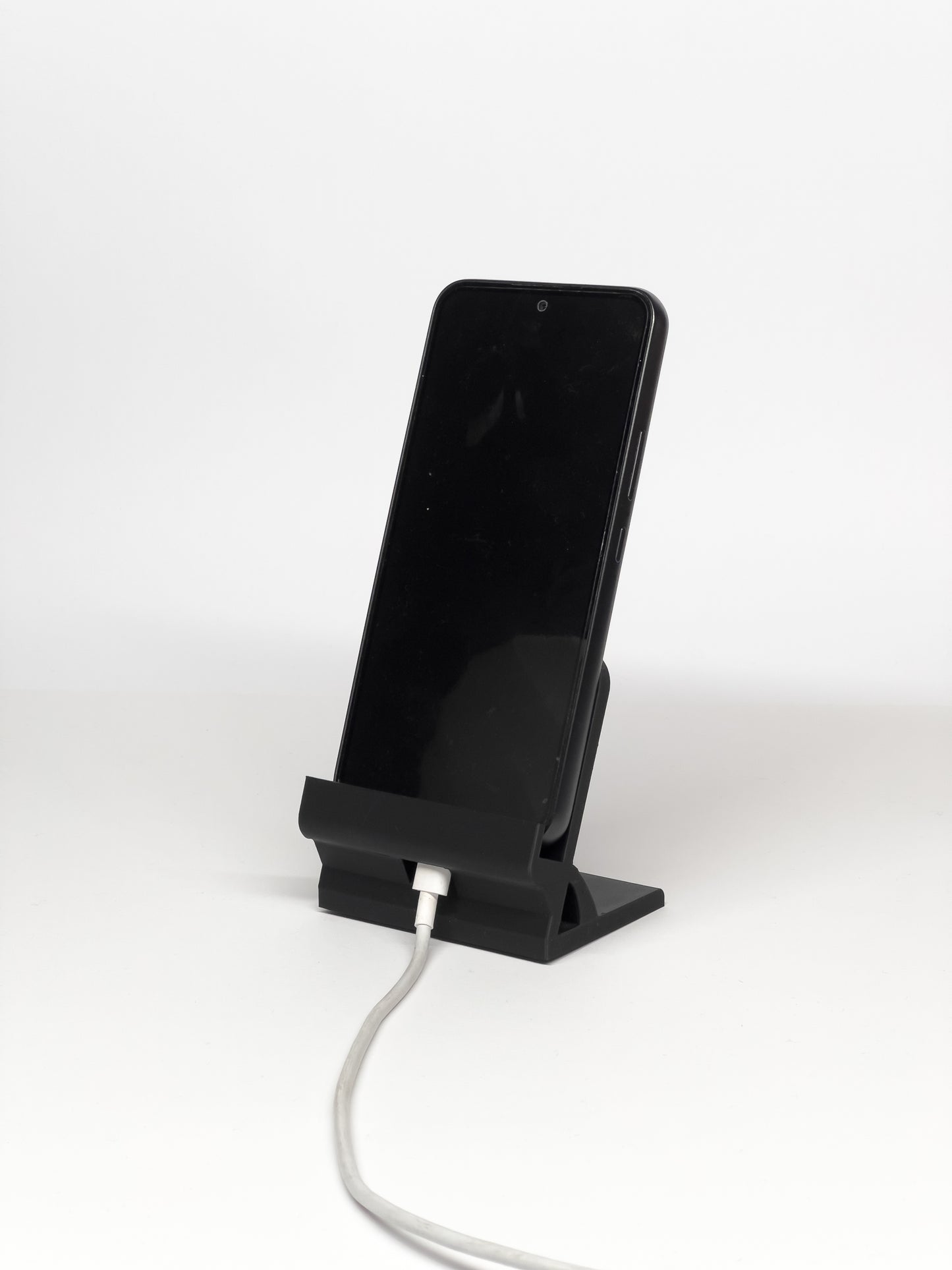 Podstawka pod telefon z możliwością ładowania